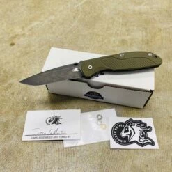 Rick Hinderer Tri-Way Firetac Folding Knife 3.625" CPM-20CV DLC Battle Black Recurve Blade, OD Green G10 And Battle Black Titanium Handle Knife